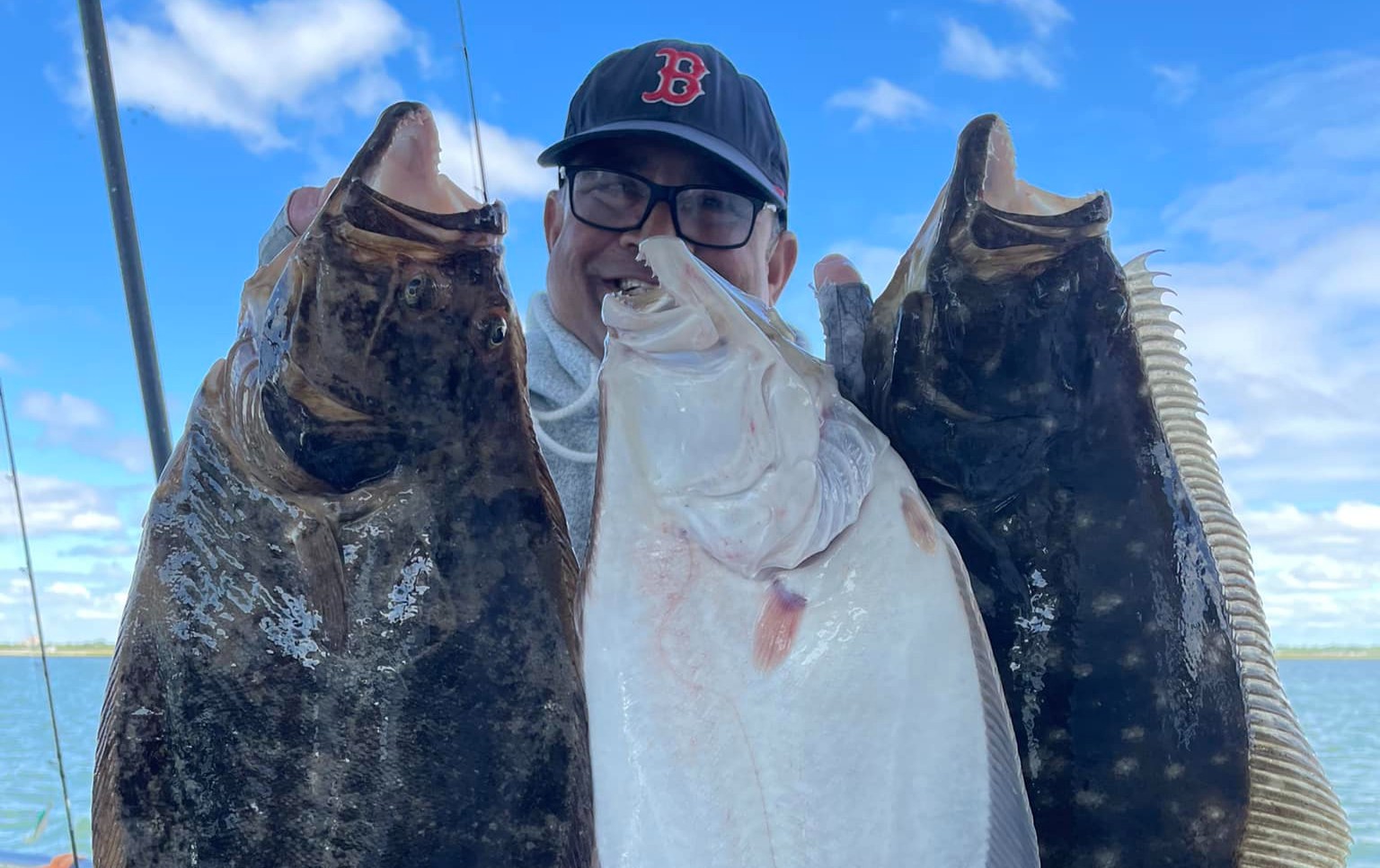 Deep sea fishing haul from Super Hawk charter boat — striped bass and blackfish near Point Lookout, NY