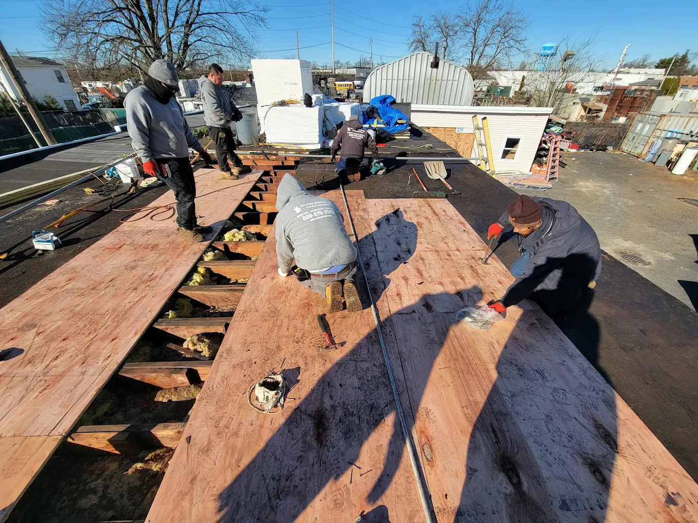TPO and EPDM commercial flat roofing installation near East Islip and Amity Harbor NY by All-Star Roofing