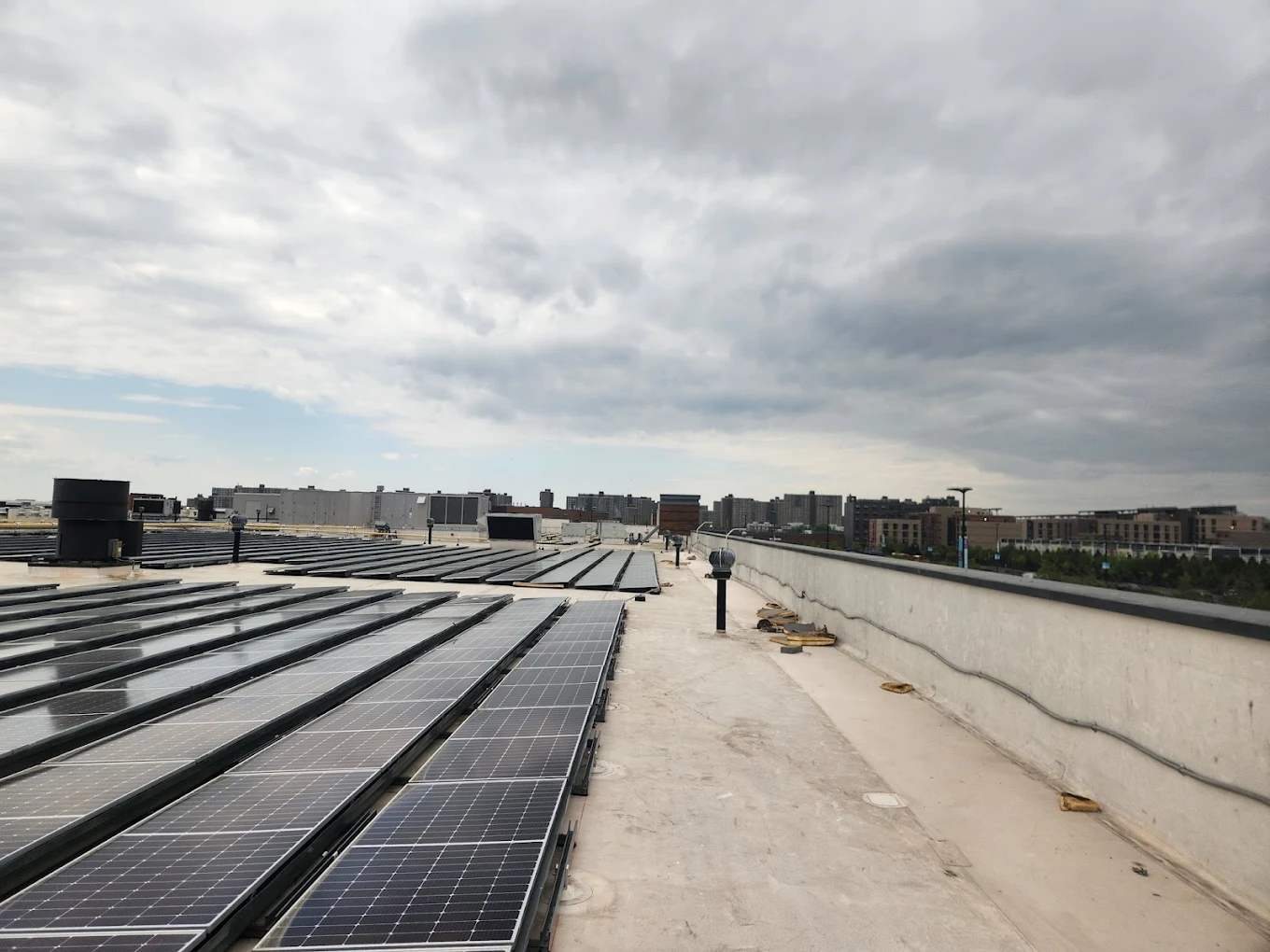 Emergency commercial flat roof repair by All-Star Roofing Inc. after storm in Amity Harbor NY